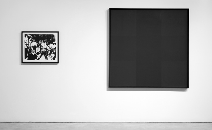 Andy Warhol, Race Riot, 1965, and Ad Reinhardt, Abstract Painting, No. 3, 1960–63. Photo by Silbila Savage, courtesy of the Berkeley Art Museum and Pacific Film Archive.