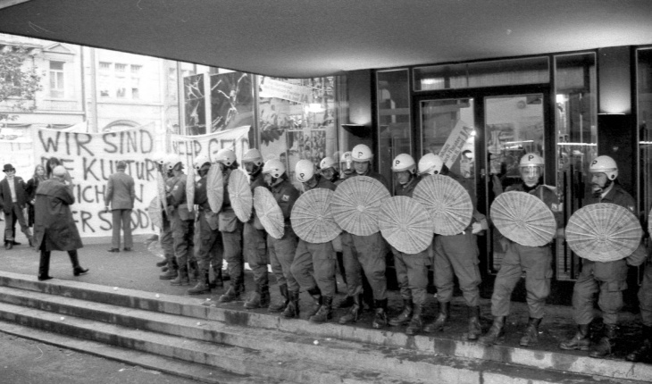 Police lines protect Zürich's opera house during the first major demonstration against cultural conservatism in Zürich's the so-called 
